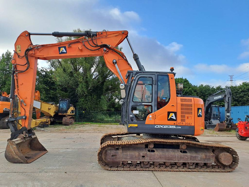 Doosan DX 235 LCR-5 - Telakaivukone: kuva Doosan DX 235 LCR-5 - Telakaivukone Doosan DX 235 LCR-5 - Telakaivukone: kuva Doosan DX 235 LCR-5 - Telakaivukone
