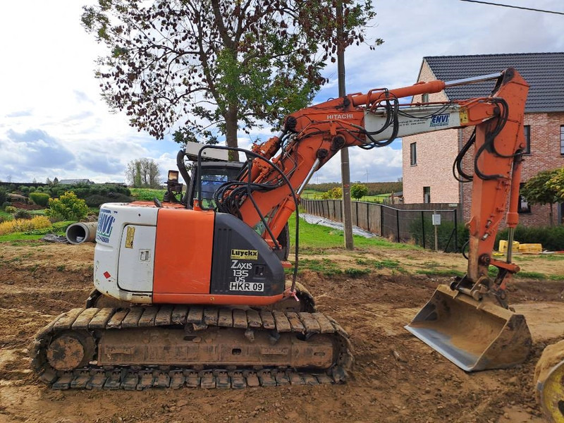 Hitachi ZX135US - Telakaivukone: kuva Hitachi ZX135US - Telakaivukone Hitachi ZX135US - Telakaivukone: kuva Hitachi ZX135US - Telakaivukone