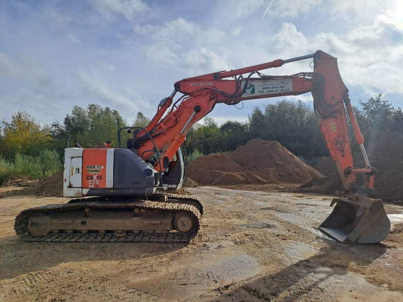 Hitachi ZX225USLC-3 - Telakaivukone: kuva Hitachi ZX225USLC-3 - Telakaivukone Hitachi ZX225USLC-3 - Telakaivukone: kuva Hitachi ZX225USLC-3 - Telakaivukone