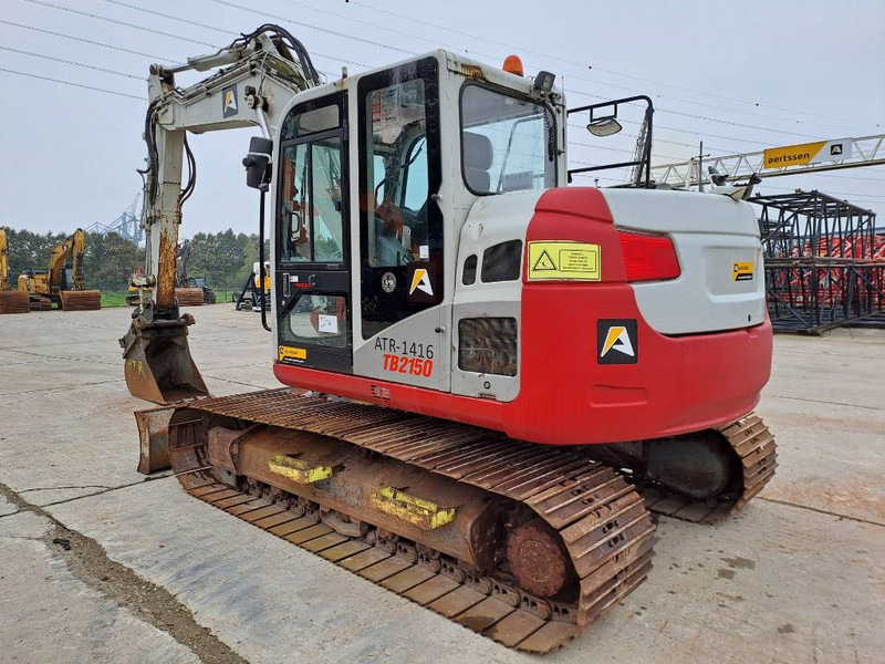 Takeuchi TB 2150 - Telakaivukone: kuva Takeuchi TB 2150 - Telakaivukone Takeuchi TB 2150 - Telakaivukone: kuva Takeuchi TB 2150 - Telakaivukone