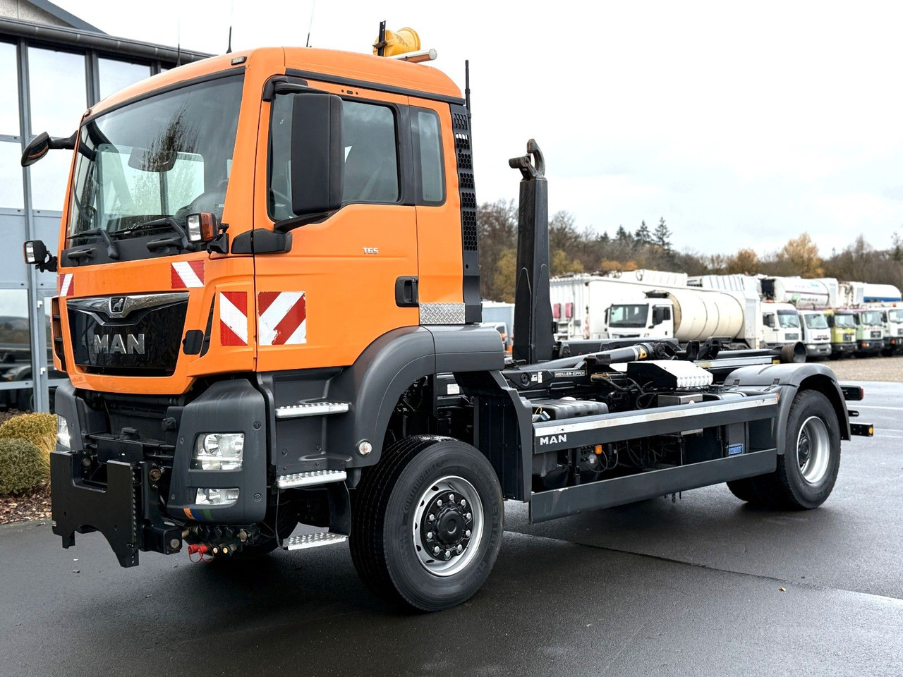 MAN TGS 18.360 4x4 Winterdienst Meiller Abroller - Koukkulava kuorma-auto: kuva MAN TGS 18.360 4x4 Winterdienst Meiller Abroller - Koukkulava kuorma-auto MAN TGS 18.360 4x4 Winterdienst Meiller Abroller - Koukkulava kuorma-auto: kuva MAN TGS 18.360 4x4 Winterdienst Meiller Abroller - Koukkulava kuorma-auto