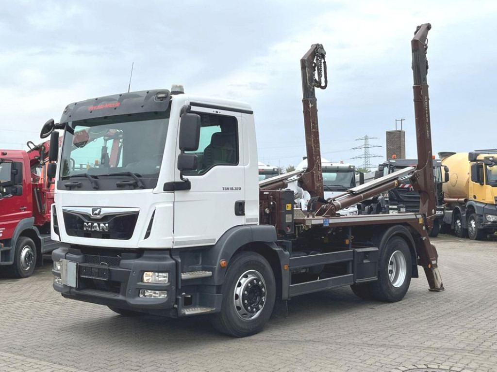 MAN TG-M 18.320 4x2 Absetzkipper Meiller, Funk - Nostovarsi-vaihtolavakuorma kuorma-auto: kuva MAN TG-M 18.320 4x2 Absetzkipper Meiller, Funk - Nostovarsi-vaihtolavakuorma kuorma-auto MAN TG-M 18.320 4x2 Absetzkipper Meiller, Funk - Nostovarsi-vaihtolavakuorma kuorma-auto: kuva MAN TG-M 18.320 4x2 Absetzkipper Meiller, Funk - Nostovarsi-vaihtolavakuorma kuorma-auto