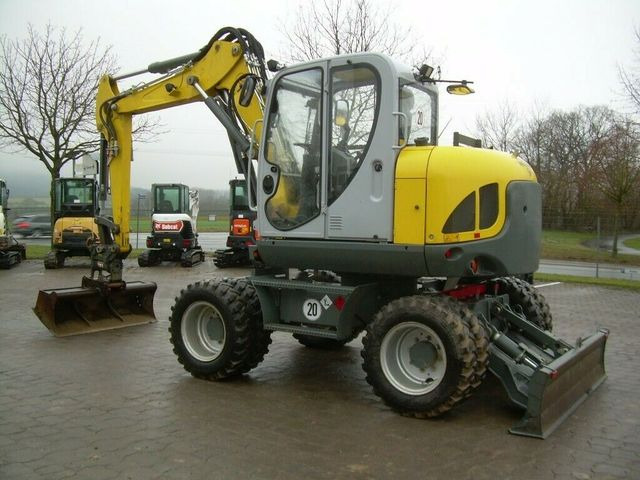 Wacker EW 100, Bj 20, 1750 BH, VA, Powertilt HS08, GL Wacker EW 100, Bj 20, 1750 BH, VA, Powertilt HS08, GL - Pyöräalustainen kaivinkone: kuva Wacker EW 100, Bj 20, 1750 BH, VA, Powertilt HS08, GL Wacker EW 100, Bj 20, 1750 BH, VA, Powertilt HS08, GL - Pyöräalustainen kaivinkone Wacker EW 100, Bj 20, 1750 BH, VA, Powertilt HS08, GL Wacker EW 100, Bj 20, 1750 BH, VA, Powertilt HS08, GL - Pyöräalustainen kaivinkone: kuva Wacker EW 100, Bj 20, 1750 BH, VA, Powertilt HS08, GL Wacker EW 100, Bj 20, 1750 BH, VA, Powertilt HS08, GL - Pyöräalustainen kaivinkone