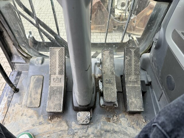 CAT M318D Mobilbagger *9.235 h *Schnellw. *Greifer - Pyöräalustainen kaivinkone: kuva CAT M318D Mobilbagger *9.235 h *Schnellw. *Greifer - Pyöräalustainen kaivinkone CAT M318D Mobilbagger *9.235 h *Schnellw. *Greifer - Pyöräalustainen kaivinkone: kuva CAT M318D Mobilbagger *9.235 h *Schnellw. *Greifer - Pyöräalustainen kaivinkone