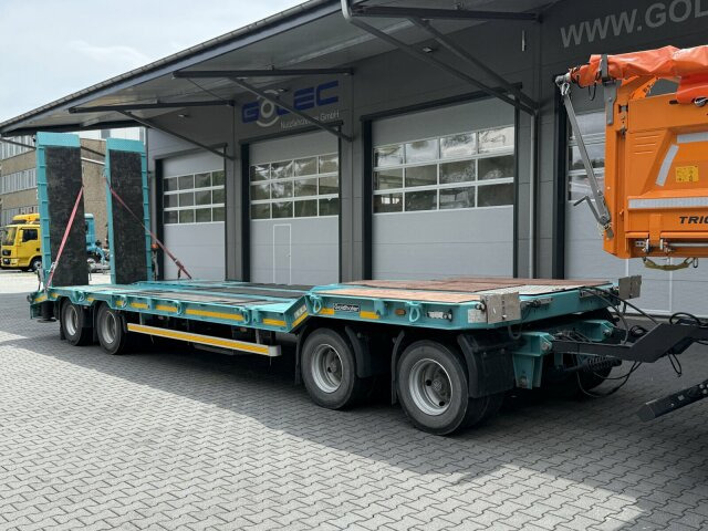 Goldhofer TU 4 EXPERT 4870 Tieflader Anhänger 44,8 T - Apuvaunu perävaunu: kuva Goldhofer TU 4 EXPERT 4870 Tieflader Anhänger 44,8 T - Apuvaunu perävaunu Goldhofer TU 4 EXPERT 4870 Tieflader Anhänger 44,8 T - Apuvaunu perävaunu: kuva Goldhofer TU 4 EXPERT 4870 Tieflader Anhänger 44,8 T - Apuvaunu perävaunu