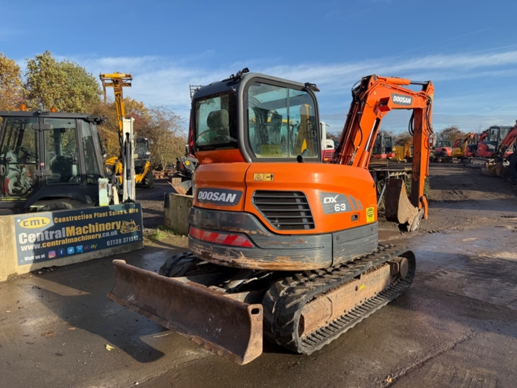 Doosan DX 63-3 - Minikuormaaja: kuva Doosan DX 63-3 - Minikuormaaja Doosan DX 63-3 - Minikuormaaja: kuva Doosan DX 63-3 - Minikuormaaja