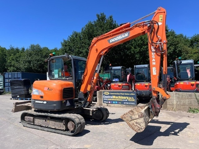 Doosan DX 63-3 - Minikuormaaja: kuva Doosan DX 63-3 - Minikuormaaja Doosan DX 63-3 - Minikuormaaja: kuva Doosan DX 63-3 - Minikuormaaja