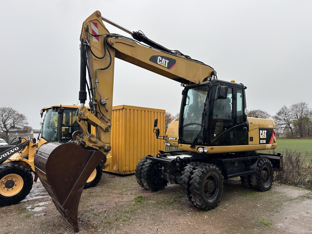 CATERPILLAR M 316 D full Hydr. Top Zustand German machine ! - Pyöräalustainen kaivinkone: kuva CATERPILLAR M 316 D full Hydr. Top Zustand German machine ! - Pyöräalustainen kaivinkone CATERPILLAR M 316 D full Hydr. Top Zustand German machine ! - Pyöräalustainen kaivinkone: kuva CATERPILLAR M 316 D full Hydr. Top Zustand German machine ! - Pyöräalustainen kaivinkone