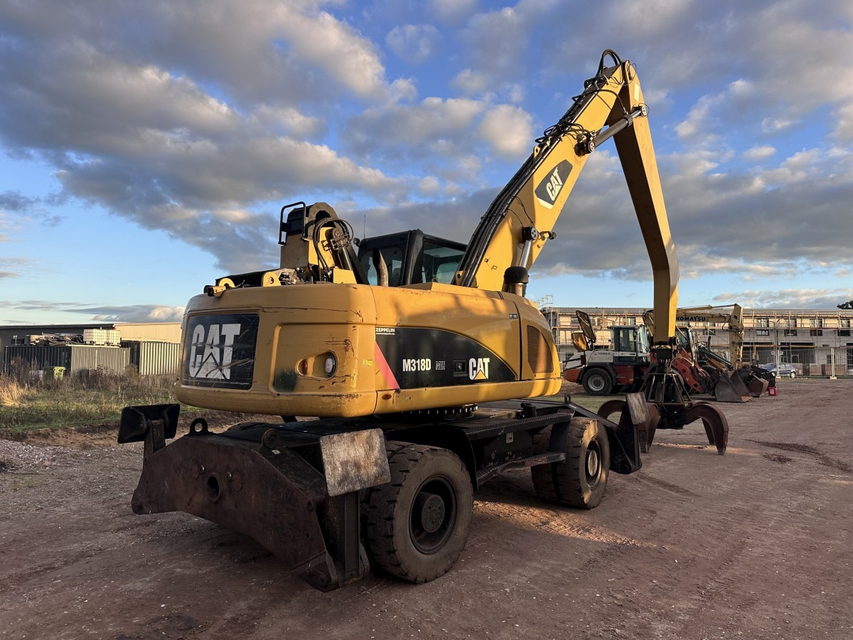 CATERPILLAR M 318 MH mit Greifer Kein 3022 3026 320 322 - Materiaalinkäsittelykone: kuva CATERPILLAR M 318 MH mit Greifer Kein 3022 3026 320 322 - Materiaalinkäsittelykone CATERPILLAR M 318 MH mit Greifer Kein 3022 3026 320 322 - Materiaalinkäsittelykone: kuva CATERPILLAR M 318 MH mit Greifer Kein 3022 3026 320 322 - Materiaalinkäsittelykone