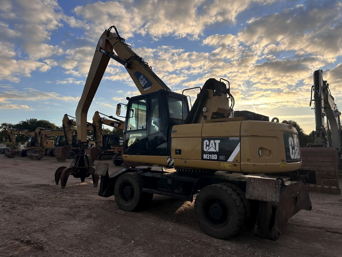 CATERPILLAR M 318 MH mit Greifer Kein 3022 3026 320 322 - Materiaalinkäsittelykone: kuva CATERPILLAR M 318 MH mit Greifer Kein 3022 3026 320 322 - Materiaalinkäsittelykone CATERPILLAR M 318 MH mit Greifer Kein 3022 3026 320 322 - Materiaalinkäsittelykone: kuva CATERPILLAR M 318 MH mit Greifer Kein 3022 3026 320 322 - Materiaalinkäsittelykone