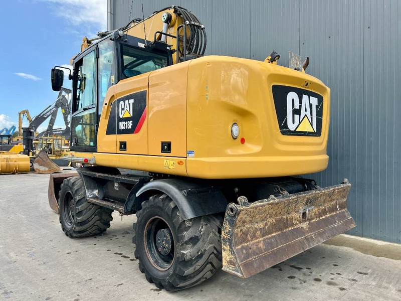 Cat M318F - Pyöräalustainen kaivinkone: kuva Cat M318F - Pyöräalustainen kaivinkone Cat M318F - Pyöräalustainen kaivinkone: kuva Cat M318F - Pyöräalustainen kaivinkone