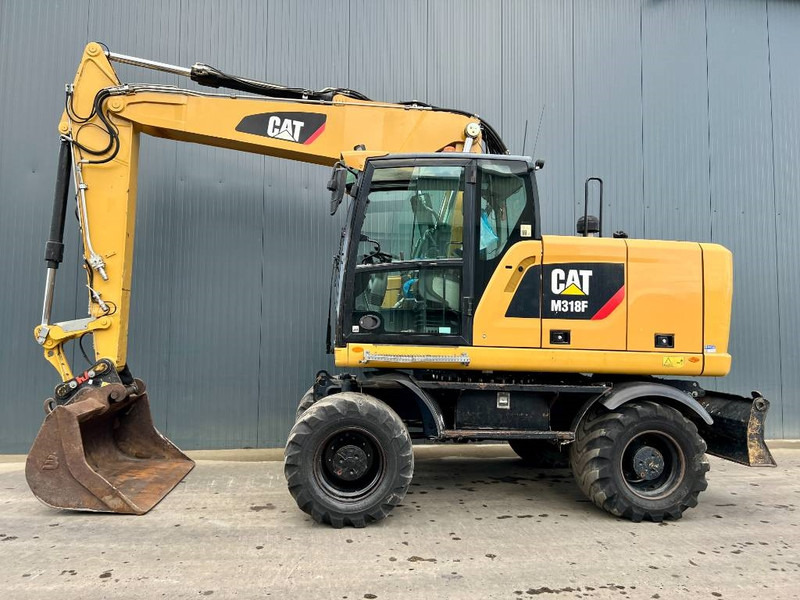 Cat M318F - Pyöräalustainen kaivinkone: kuva Cat M318F - Pyöräalustainen kaivinkone Cat M318F - Pyöräalustainen kaivinkone: kuva Cat M318F - Pyöräalustainen kaivinkone