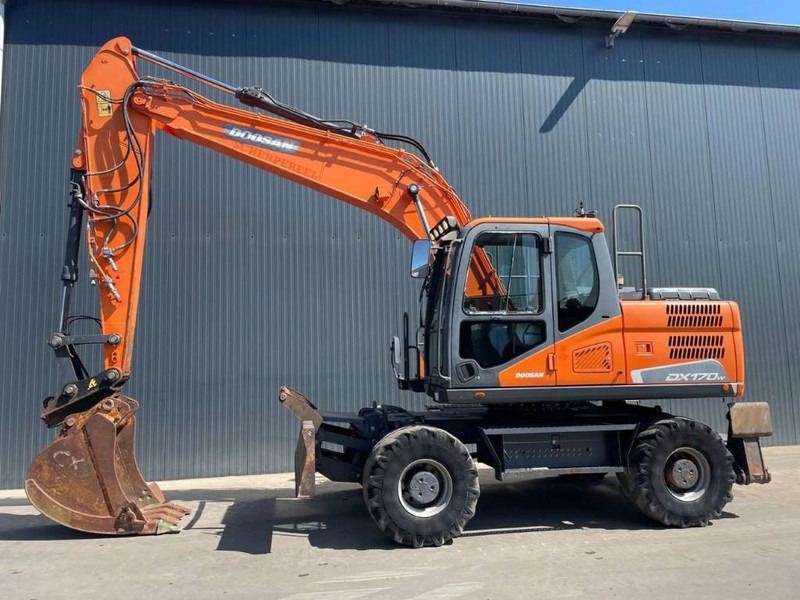 Doosan DX170W-5 - Pyöräalustainen kaivinkone: kuva Doosan DX170W-5 - Pyöräalustainen kaivinkone Doosan DX170W-5 - Pyöräalustainen kaivinkone: kuva Doosan DX170W-5 - Pyöräalustainen kaivinkone