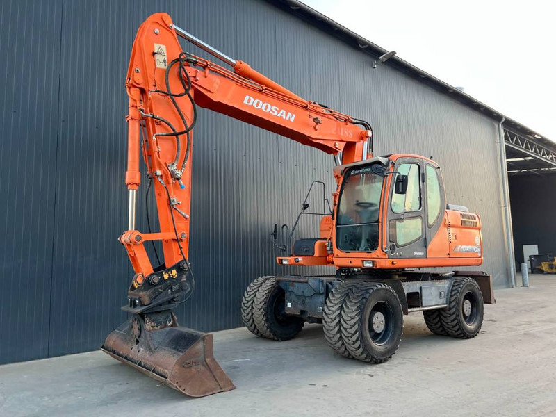 Doosan DX170W - Pyöräalustainen kaivinkone: kuva Doosan DX170W - Pyöräalustainen kaivinkone Doosan DX170W - Pyöräalustainen kaivinkone: kuva Doosan DX170W - Pyöräalustainen kaivinkone