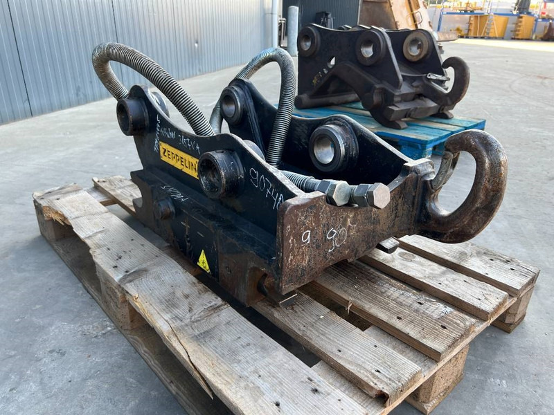 OilQuick OQ65 - 311F / 313F / 315F - Pikaliitin - Rakennuskoneet: kuva OilQuick OQ65 - 311F / 313F / 315F - Pikaliitin - Rakennuskoneet OilQuick OQ65 - 311F / 313F / 315F - Pikaliitin - Rakennuskoneet: kuva OilQuick OQ65 - 311F / 313F / 315F - Pikaliitin - Rakennuskoneet