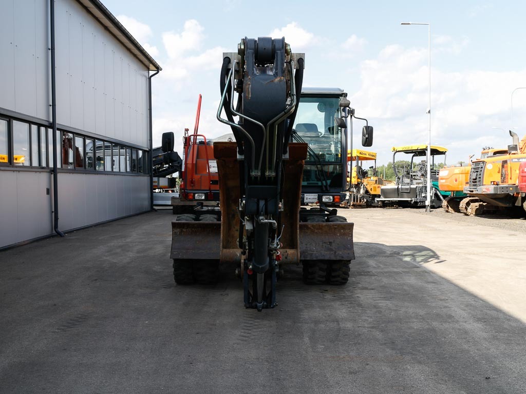 - Pyöräalustainen kaivinkone: kuva - Pyöräalustainen kaivinkone - Pyöräalustainen kaivinkone: kuva - Pyöräalustainen kaivinkone