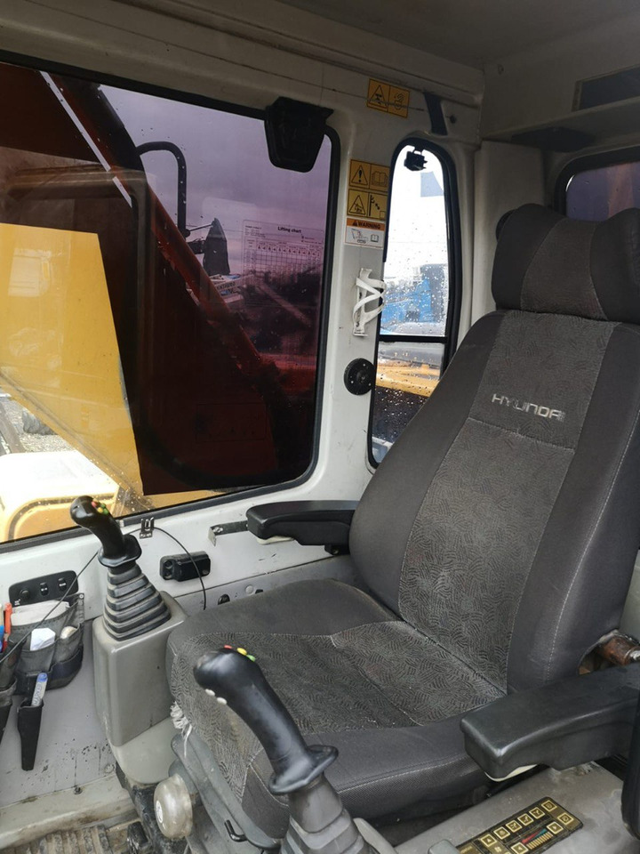 HYUNDAI 210 - Pyöräalustainen kaivinkone: kuva HYUNDAI 210 - Pyöräalustainen kaivinkone HYUNDAI 210 - Pyöräalustainen kaivinkone: kuva HYUNDAI 210 - Pyöräalustainen kaivinkone