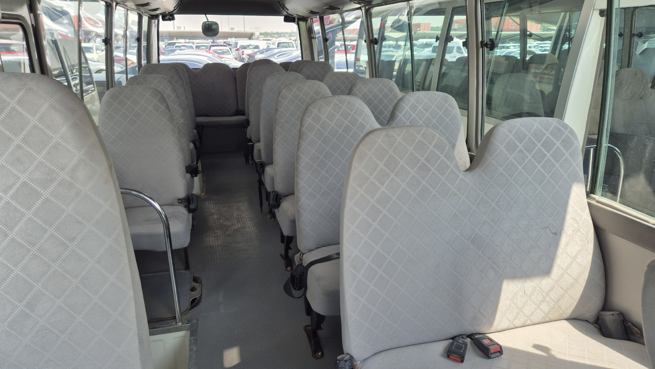 TOYOTA Coaster ... 30 places ... Climatisé - Minibussi, Pikkubussi: kuva TOYOTA Coaster ... 30 places ... Climatisé - Minibussi, Pikkubussi TOYOTA Coaster ... 30 places ... Climatisé - Minibussi, Pikkubussi: kuva TOYOTA Coaster ... 30 places ... Climatisé - Minibussi, Pikkubussi