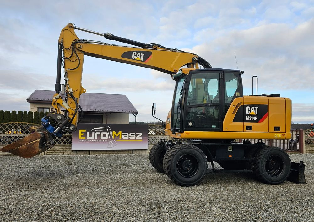Caterpillar M314F, 2019 ROK, 5600 MTH, GŁOWICA SMP - Pyöräalustainen kaivinkone: kuva Caterpillar M314F, 2019 ROK, 5600 MTH, GŁOWICA SMP - Pyöräalustainen kaivinkone Caterpillar M314F, 2019 ROK, 5600 MTH, GŁOWICA SMP - Pyöräalustainen kaivinkone: kuva Caterpillar M314F, 2019 ROK, 5600 MTH, GŁOWICA SMP - Pyöräalustainen kaivinkone