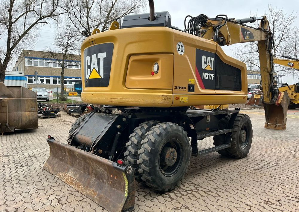Caterpillar M317F, 2019 ROK, 5100 MTH, OIL QUICK - Pyöräalustainen kaivinkone: kuva Caterpillar M317F, 2019 ROK, 5100 MTH, OIL QUICK - Pyöräalustainen kaivinkone Caterpillar M317F, 2019 ROK, 5100 MTH, OIL QUICK - Pyöräalustainen kaivinkone: kuva Caterpillar M317F, 2019 ROK, 5100 MTH, OIL QUICK - Pyöräalustainen kaivinkone