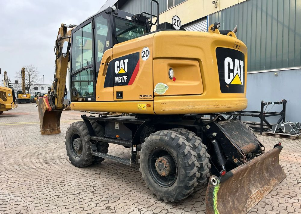 Caterpillar M317F, 2019 ROK, 5100 MTH, OIL QUICK - Pyöräalustainen kaivinkone: kuva Caterpillar M317F, 2019 ROK, 5100 MTH, OIL QUICK - Pyöräalustainen kaivinkone Caterpillar M317F, 2019 ROK, 5100 MTH, OIL QUICK - Pyöräalustainen kaivinkone: kuva Caterpillar M317F, 2019 ROK, 5100 MTH, OIL QUICK - Pyöräalustainen kaivinkone