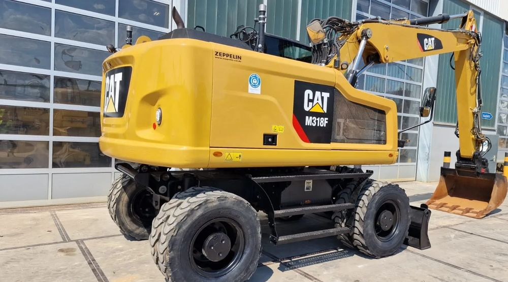 Caterpillar M318F, 2019 ROK, IMPORT NIEMCY - Pyöräalustainen kaivinkone: kuva Caterpillar M318F, 2019 ROK, IMPORT NIEMCY - Pyöräalustainen kaivinkone Caterpillar M318F, 2019 ROK, IMPORT NIEMCY - Pyöräalustainen kaivinkone: kuva Caterpillar M318F, 2019 ROK, IMPORT NIEMCY - Pyöräalustainen kaivinkone