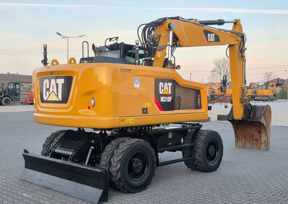 Caterpillar M318F, 2019 ROK, IMPORT NIEMCY - Pyöräalustainen kaivinkone: kuva Caterpillar M318F, 2019 ROK, IMPORT NIEMCY - Pyöräalustainen kaivinkone Caterpillar M318F, 2019 ROK, IMPORT NIEMCY - Pyöräalustainen kaivinkone: kuva Caterpillar M318F, 2019 ROK, IMPORT NIEMCY - Pyöräalustainen kaivinkone