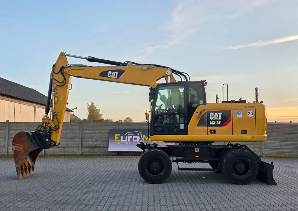 Caterpillar M318F, 2019 ROK, IMPORT NIEMCY - Pyöräalustainen kaivinkone: kuva Caterpillar M318F, 2019 ROK, IMPORT NIEMCY - Pyöräalustainen kaivinkone Caterpillar M318F, 2019 ROK, IMPORT NIEMCY - Pyöräalustainen kaivinkone: kuva Caterpillar M318F, 2019 ROK, IMPORT NIEMCY - Pyöräalustainen kaivinkone
