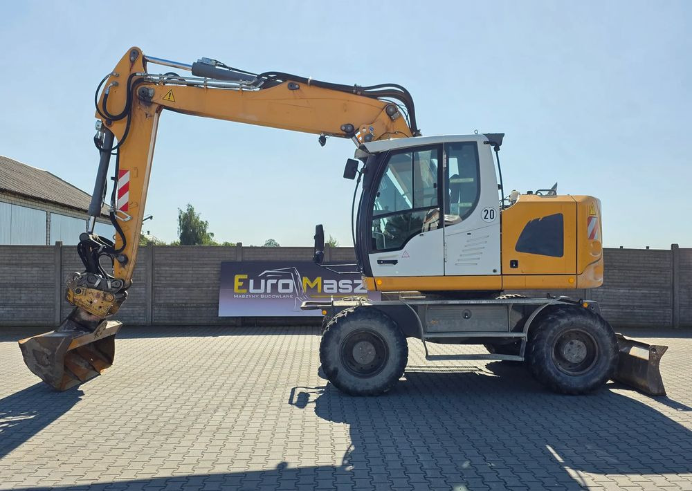 Liebherr A918 COMPACT, 2014 ROK, SW 48 LIKUFIX szybkozłącze - Pyöräalustainen kaivinkone: kuva Liebherr A918 COMPACT, 2014 ROK, SW 48 LIKUFIX szybkozłącze - Pyöräalustainen kaivinkone Liebherr A918 COMPACT, 2014 ROK, SW 48 LIKUFIX szybkozłącze - Pyöräalustainen kaivinkone: kuva Liebherr A918 COMPACT, 2014 ROK, SW 48 LIKUFIX szybkozłącze - Pyöräalustainen kaivinkone