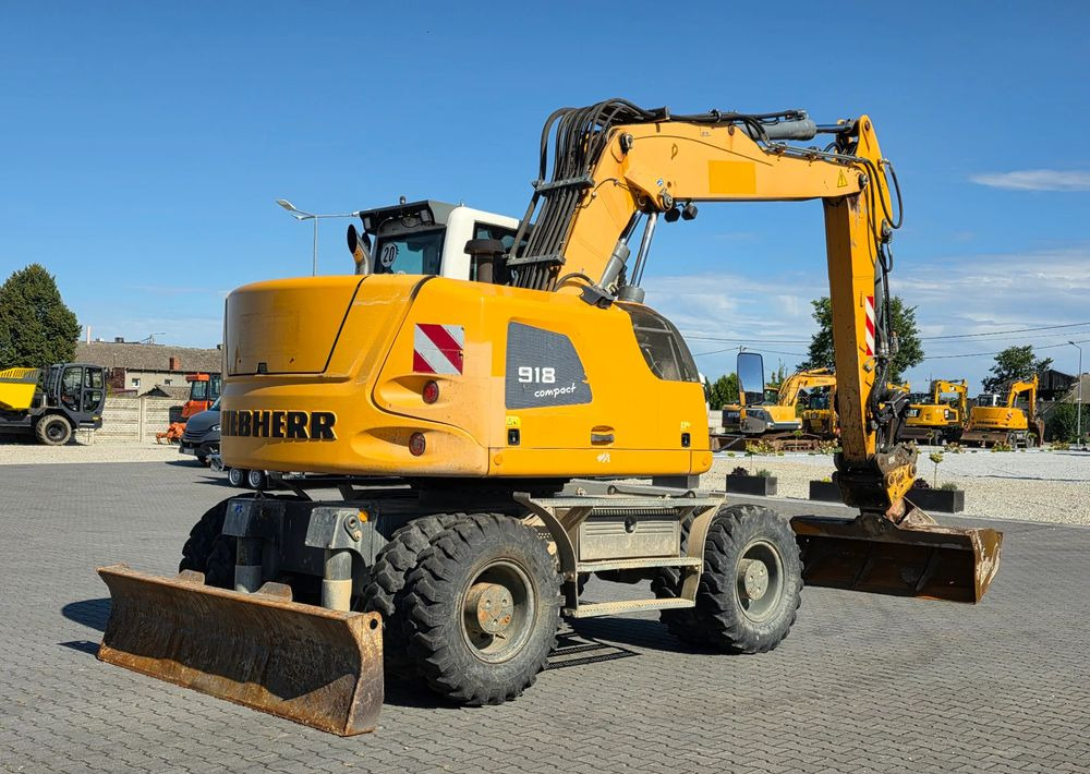 Liebherr A918 COMPACT, 2014 ROK, SW 48 LIKUFIX szybkozłącze - Pyöräalustainen kaivinkone: kuva Liebherr A918 COMPACT, 2014 ROK, SW 48 LIKUFIX szybkozłącze - Pyöräalustainen kaivinkone Liebherr A918 COMPACT, 2014 ROK, SW 48 LIKUFIX szybkozłącze - Pyöräalustainen kaivinkone: kuva Liebherr A918 COMPACT, 2014 ROK, SW 48 LIKUFIX szybkozłącze - Pyöräalustainen kaivinkone