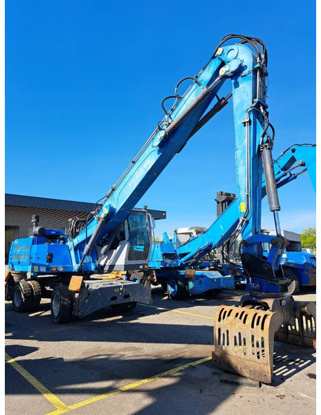 Fuchs MHL331E + Grapple - Materiaalinkäsittelykone: kuva Fuchs MHL331E + Grapple - Materiaalinkäsittelykone Fuchs MHL331E + Grapple - Materiaalinkäsittelykone: kuva Fuchs MHL331E + Grapple - Materiaalinkäsittelykone