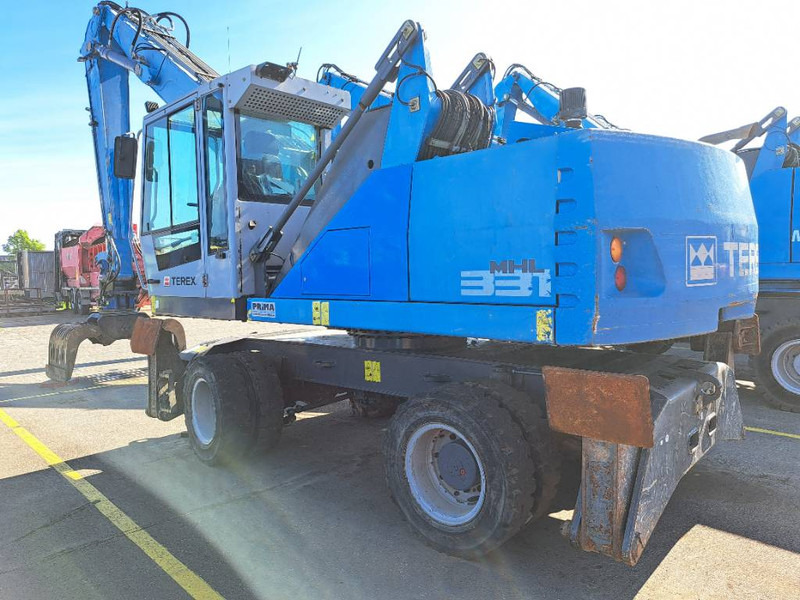 Fuchs MHL331E + Grapple - Materiaalinkäsittelykone: kuva Fuchs MHL331E + Grapple - Materiaalinkäsittelykone Fuchs MHL331E + Grapple - Materiaalinkäsittelykone: kuva Fuchs MHL331E + Grapple - Materiaalinkäsittelykone