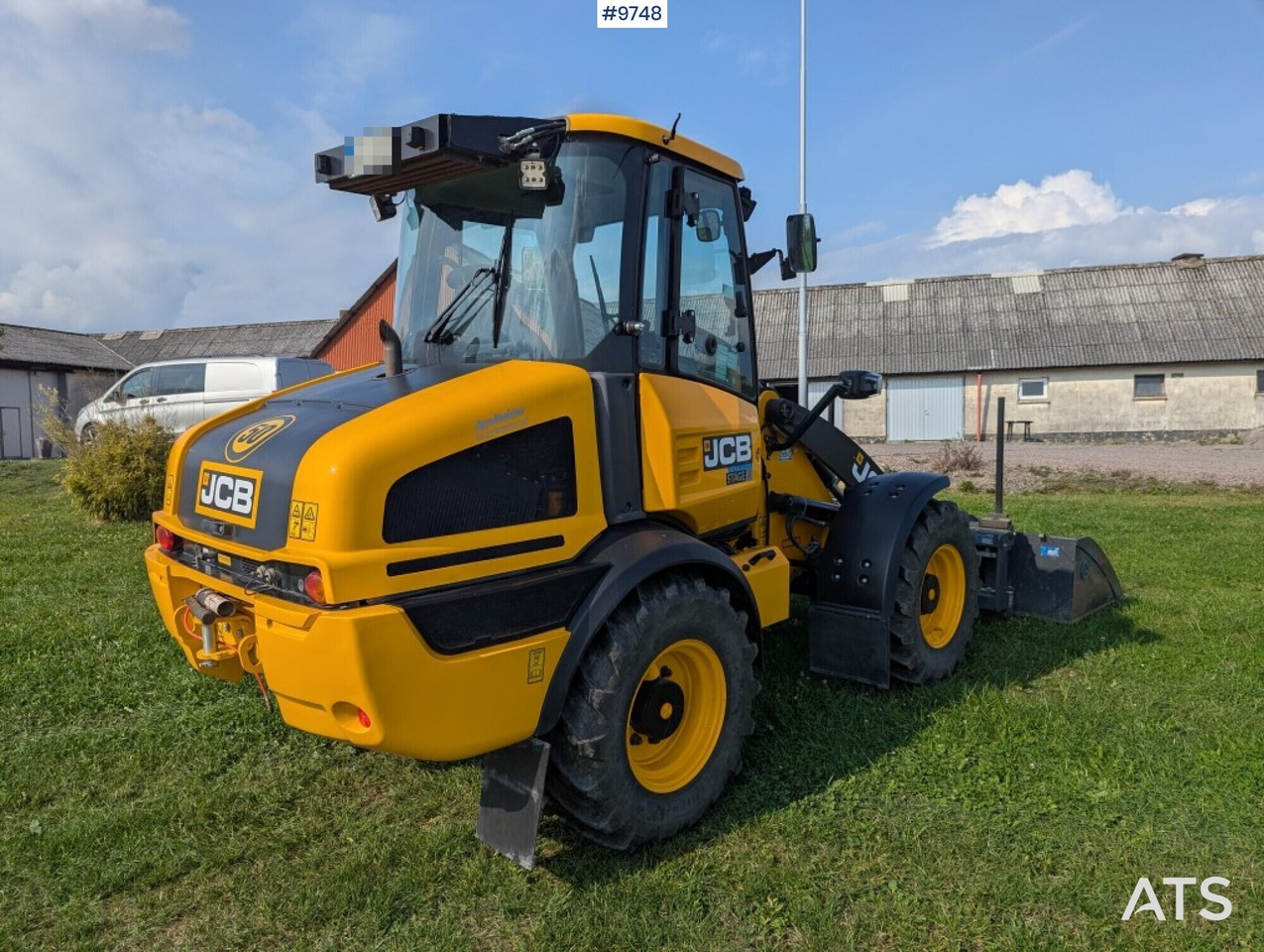 Wheel loader JCB 409 Stage V Nordic Edition 40km/h with attachments - Pyöräkuormaaja: kuva Wheel loader JCB 409 Stage V Nordic Edition 40km/h with attachments - Pyöräkuormaaja Wheel loader JCB 409 Stage V Nordic Edition 40km/h with attachments - Pyöräkuormaaja: kuva Wheel loader JCB 409 Stage V Nordic Edition 40km/h with attachments - Pyöräkuormaaja