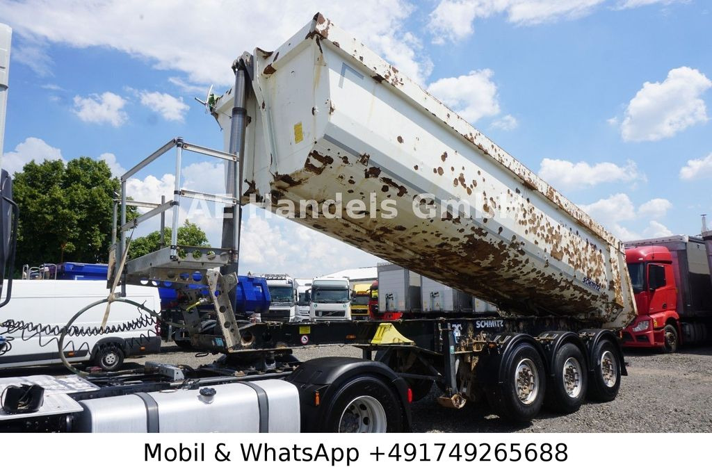Schmitz Cargobull SKI 24 Stahl *24m³ / 1.Liftachse / Rollplane - Kippiauto puoliperävaunu: kuva Schmitz Cargobull SKI 24 Stahl *24m³ / 1.Liftachse / Rollplane - Kippiauto puoliperävaunu Schmitz Cargobull SKI 24 Stahl *24m³ / 1.Liftachse / Rollplane - Kippiauto puoliperävaunu: kuva Schmitz Cargobull SKI 24 Stahl *24m³ / 1.Liftachse / Rollplane - Kippiauto puoliperävaunu