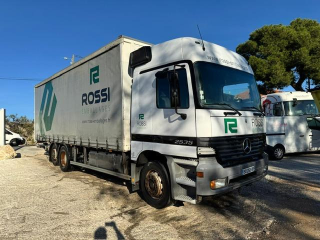 Mercedes ACTROS 2535 PLATEAU RIDELLE BACHE HAYON - Pressukapelli kuorma-auto: kuva Mercedes ACTROS 2535 PLATEAU RIDELLE BACHE HAYON - Pressukapelli kuorma-auto Mercedes ACTROS 2535 PLATEAU RIDELLE BACHE HAYON - Pressukapelli kuorma-auto: kuva Mercedes ACTROS 2535 PLATEAU RIDELLE BACHE HAYON - Pressukapelli kuorma-auto