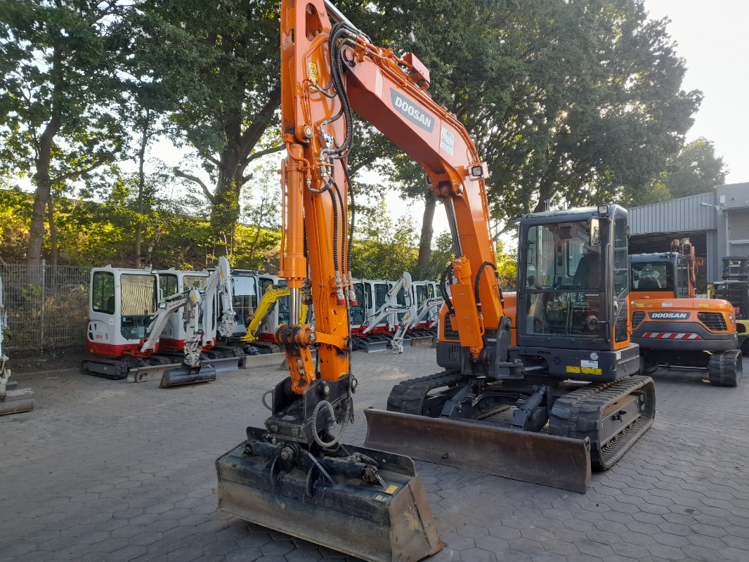 Doosan DX85R-3 - Kaivuri: kuva Doosan DX85R-3 - Kaivuri Doosan DX85R-3 - Kaivuri: kuva Doosan DX85R-3 - Kaivuri