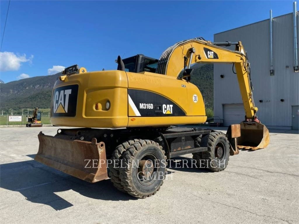 CAT M316D - Pyöräalustainen kaivinkone: kuva CAT M316D - Pyöräalustainen kaivinkone CAT M316D - Pyöräalustainen kaivinkone: kuva CAT M316D - Pyöräalustainen kaivinkone