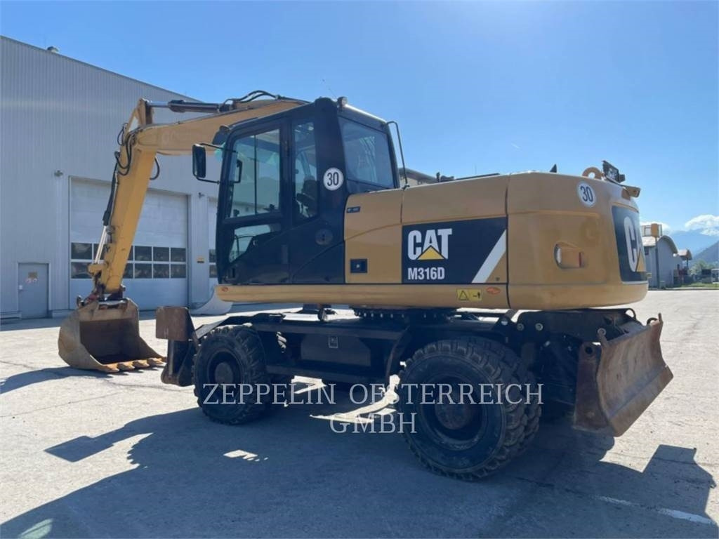 CAT M316D - Pyöräalustainen kaivinkone: kuva CAT M316D - Pyöräalustainen kaivinkone CAT M316D - Pyöräalustainen kaivinkone: kuva CAT M316D - Pyöräalustainen kaivinkone