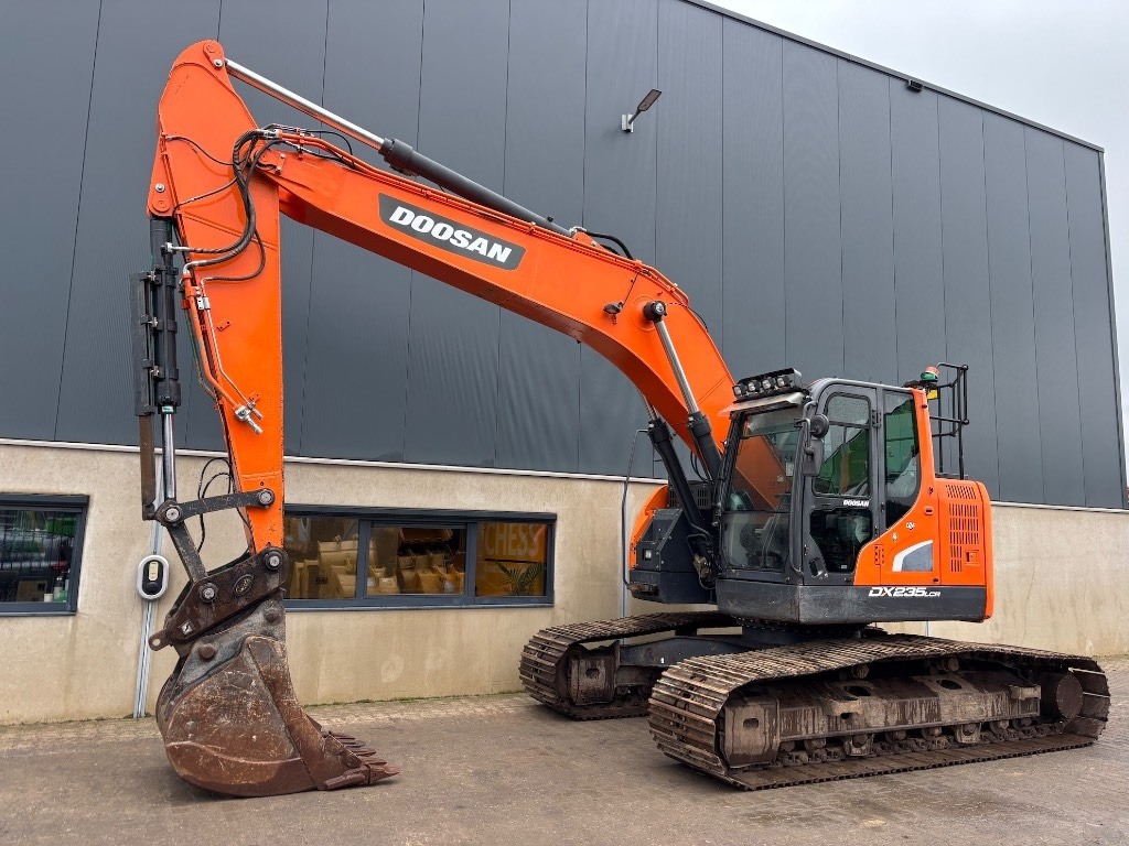 Doosan DX 235 LCR-5 - DX 235 - DX 225 - Telakaivukone: kuva Doosan DX 235 LCR-5 - DX 235 - DX 225 - Telakaivukone Doosan DX 235 LCR-5 - DX 235 - DX 225 - Telakaivukone: kuva Doosan DX 235 LCR-5 - DX 235 - DX 225 - Telakaivukone