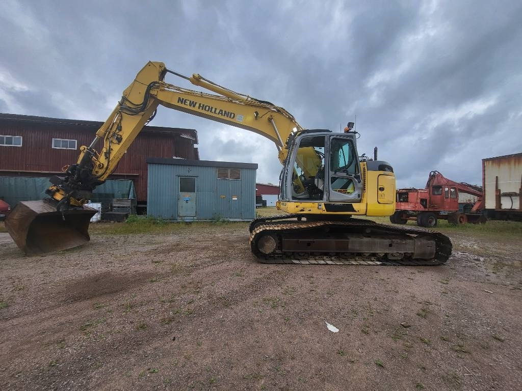 New Holland Kobelco E 235 B SR-2  - Telakaivukone: kuva New Holland Kobelco E 235 B SR-2  - Telakaivukone New Holland Kobelco E 235 B SR-2  - Telakaivukone: kuva New Holland Kobelco E 235 B SR-2  - Telakaivukone