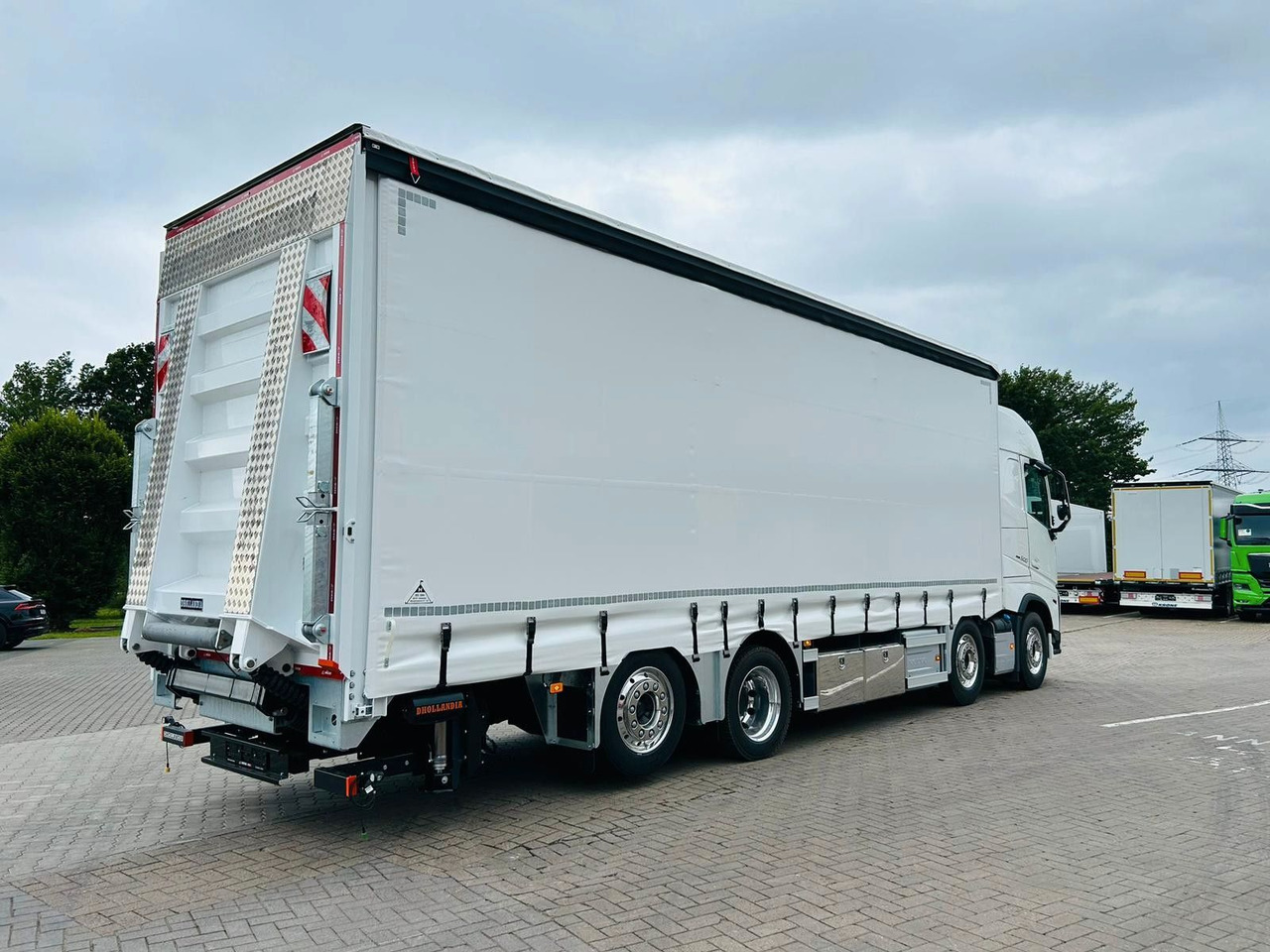 Volvo FH 500 Gabelstaplertransporter LBW Dhollandia 9t - Kuorma-auto: kuva  Volvo FH 500 Gabelstaplertransporter LBW Dhollandia 9t - Kuorma-auto Volvo FH 500 Gabelstaplertransporter LBW Dhollandia 9t - Kuorma-auto: kuva  Volvo FH 500 Gabelstaplertransporter LBW Dhollandia 9t - Kuorma-auto