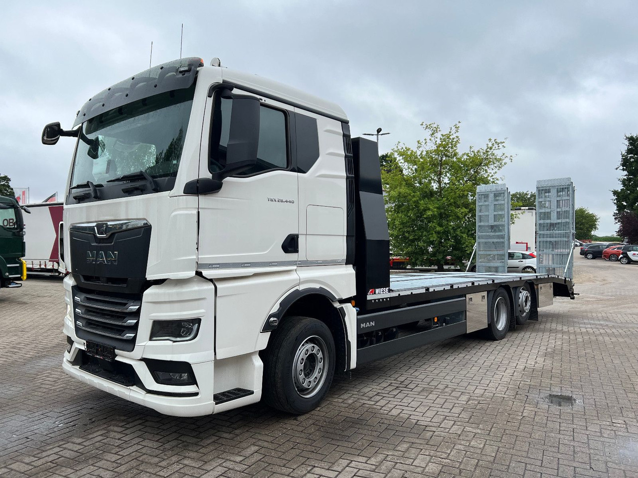 MAN Baumaschinen-  Arbeitsbühnentransporter Rampen - Hinausauto: kuva  MAN Baumaschinen-  Arbeitsbühnentransporter Rampen - Hinausauto MAN Baumaschinen-  Arbeitsbühnentransporter Rampen - Hinausauto: kuva  MAN Baumaschinen-  Arbeitsbühnentransporter Rampen - Hinausauto