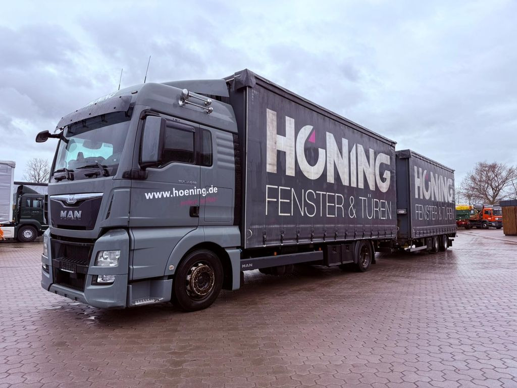MAN TGX 18.440 LL Volumen LKW mit Staplerhalterung - Pressukapelli kuorma-auto: kuva MAN TGX 18.440 LL Volumen LKW mit Staplerhalterung - Pressukapelli kuorma-auto MAN TGX 18.440 LL Volumen LKW mit Staplerhalterung - Pressukapelli kuorma-auto: kuva MAN TGX 18.440 LL Volumen LKW mit Staplerhalterung - Pressukapelli kuorma-auto