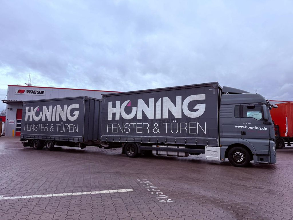 MAN TGX 18.440 LL Volumen LKW mit Staplerhalterung - Pressukapelli kuorma-auto: kuva MAN TGX 18.440 LL Volumen LKW mit Staplerhalterung - Pressukapelli kuorma-auto MAN TGX 18.440 LL Volumen LKW mit Staplerhalterung - Pressukapelli kuorma-auto: kuva MAN TGX 18.440 LL Volumen LKW mit Staplerhalterung - Pressukapelli kuorma-auto