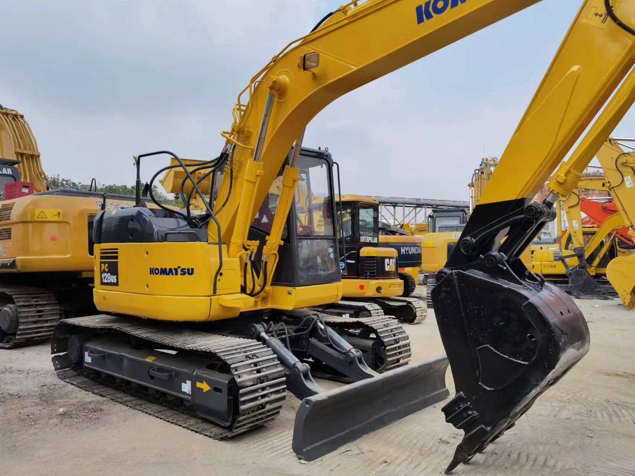 KOMATSU PC128 - Telakaivukone: kuva KOMATSU PC128 - Telakaivukone KOMATSU PC128 - Telakaivukone: kuva KOMATSU PC128 - Telakaivukone