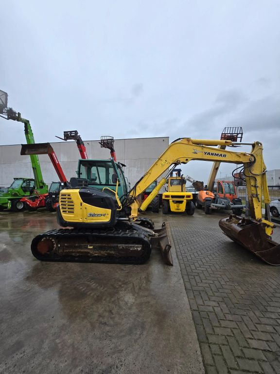 Yanmar SV100-1A - Minikuormaaja: kuva Yanmar SV100-1A - Minikuormaaja Yanmar SV100-1A - Minikuormaaja: kuva Yanmar SV100-1A - Minikuormaaja