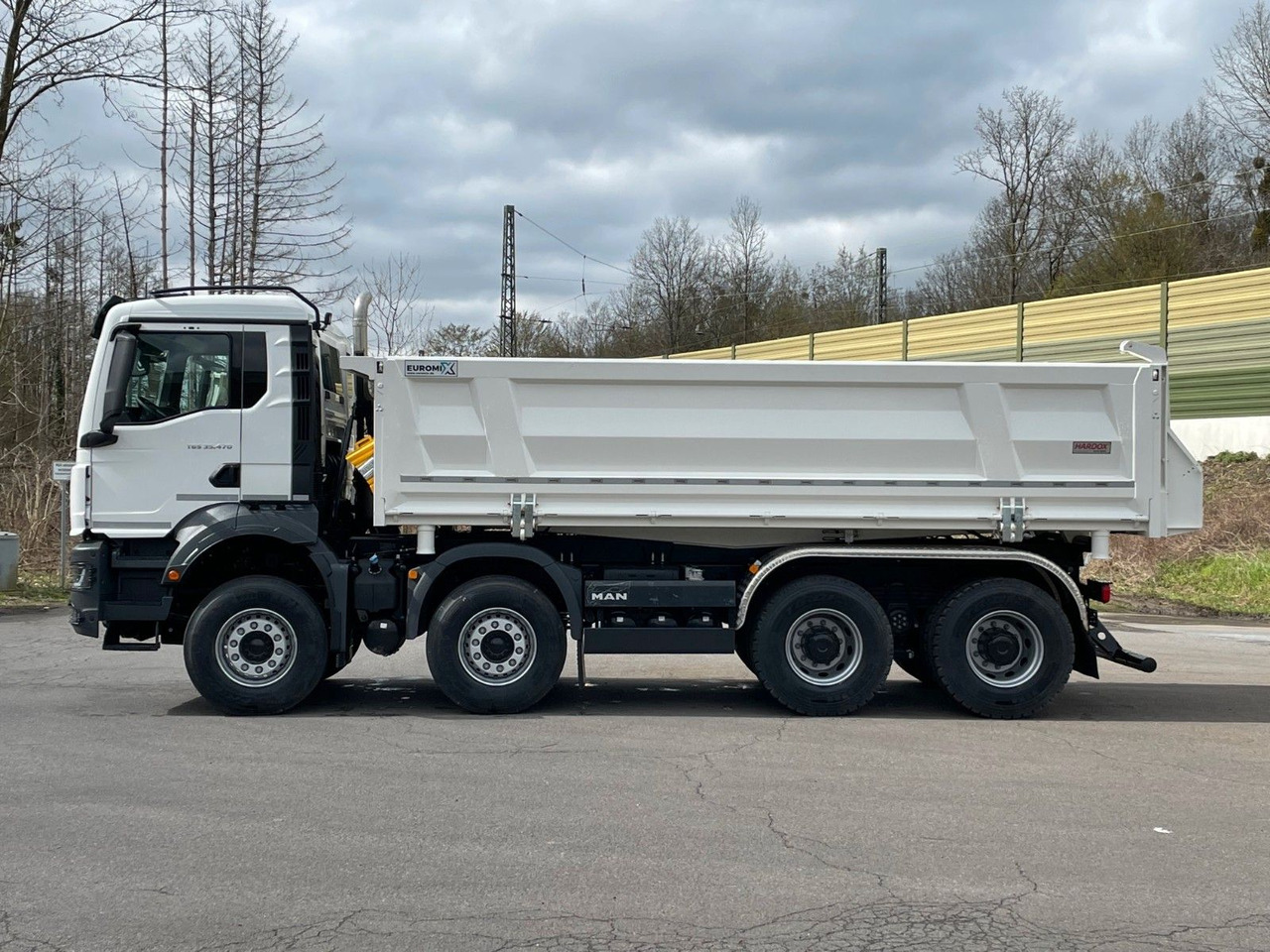 MAN TGS 35.520 8x4 EuromixMTP 3-Seiten-Kipper - Kippiauto kuorma-auto: kuva MAN TGS 35.520 8x4 EuromixMTP 3-Seiten-Kipper - Kippiauto kuorma-auto MAN TGS 35.520 8x4 EuromixMTP 3-Seiten-Kipper - Kippiauto kuorma-auto: kuva MAN TGS 35.520 8x4 EuromixMTP 3-Seiten-Kipper - Kippiauto kuorma-auto