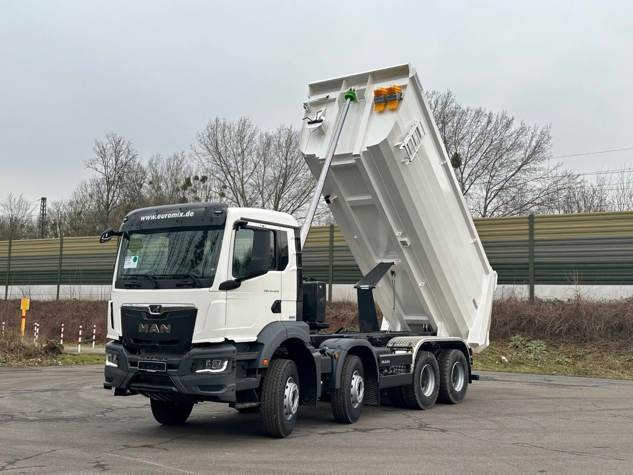 MAN TGS 41.400 8x4 / EUROMIX MTP 20m³/ EURO 5 - Nostovarsi-vaihtolavakuorma kuorma-auto: kuva MAN TGS 41.400 8x4 / EUROMIX MTP 20m³/ EURO 5 - Nostovarsi-vaihtolavakuorma kuorma-auto MAN TGS 41.400 8x4 / EUROMIX MTP 20m³/ EURO 5 - Nostovarsi-vaihtolavakuorma kuorma-auto: kuva MAN TGS 41.400 8x4 / EUROMIX MTP 20m³/ EURO 5 - Nostovarsi-vaihtolavakuorma kuorma-auto