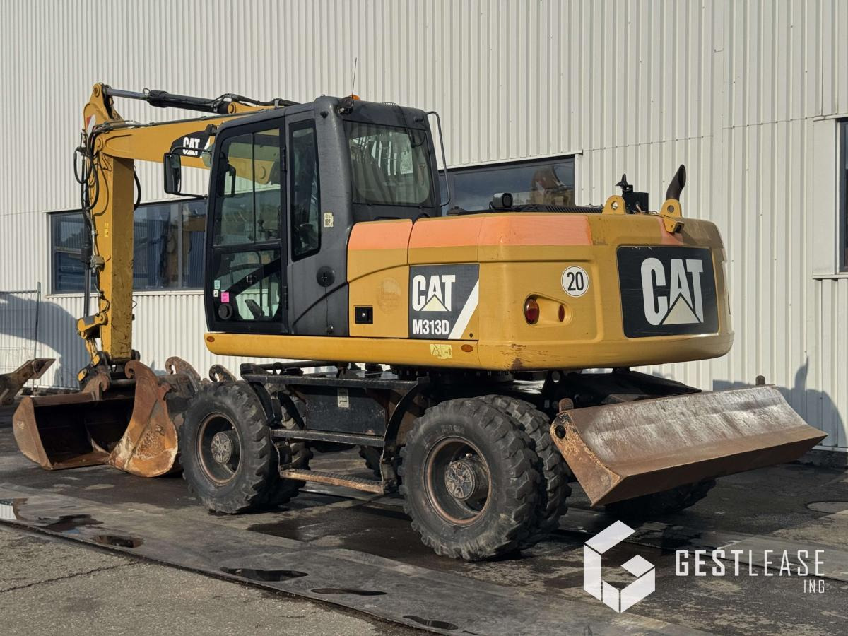 Caterpillar M313D - Pyöräalustainen kaivinkone: kuva Caterpillar M313D - Pyöräalustainen kaivinkone Caterpillar M313D - Pyöräalustainen kaivinkone: kuva Caterpillar M313D - Pyöräalustainen kaivinkone