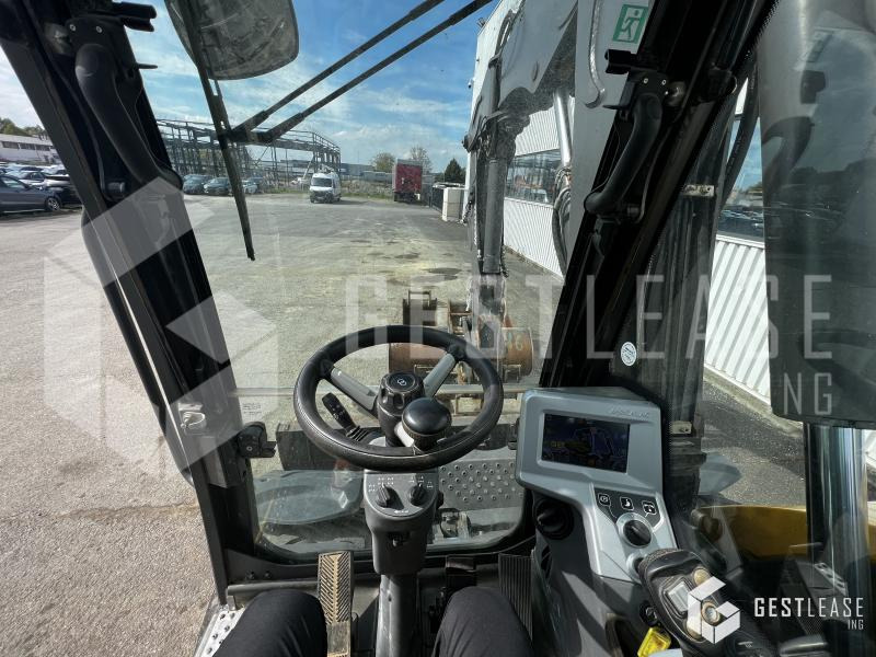 Pyöräalustainen kaivinkone Mecalac 11 MWR: kuva Pyöräalustainen kaivinkone Mecalac 11 MWR